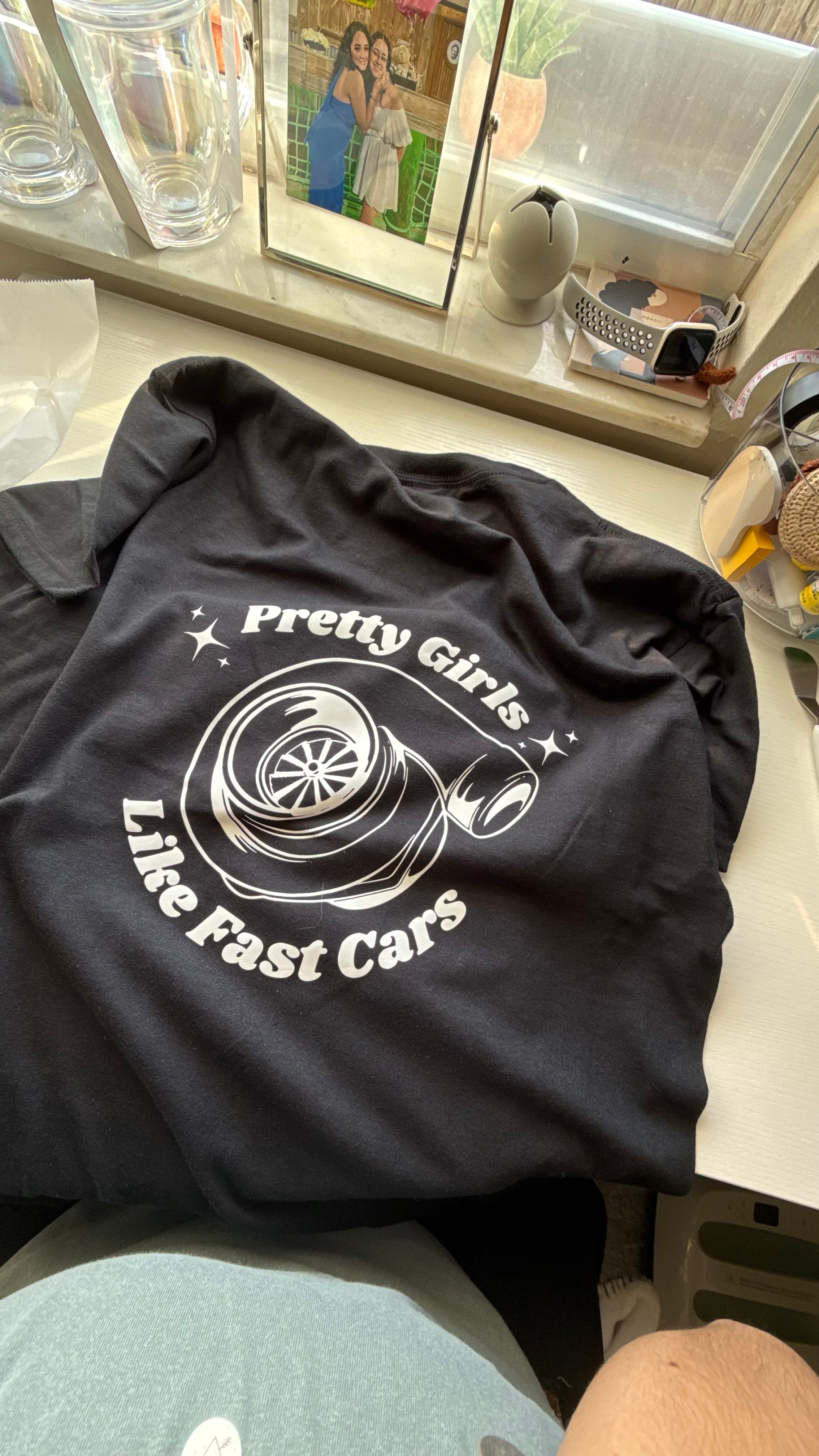 Pretty girls like fast cars